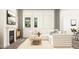 Bright and airy living room featuring a fireplace, large windows, and modern decor at 312 Calvander Ln, Apex, NC 27539