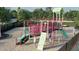 Fun playground with slides, climbing structures, and soft sand, perfect for children to enjoy outdoor activities at 312 Calvander Ln, Apex, NC 27539