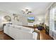 Inviting living room with hardwood floors, modern decor, and a comfortable sofa at 322 Brier Crossings Loop, Durham, NC 27703