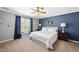 Bright bedroom with natural light, carpet, ceiling fan, and a serene atmosphere at 322 Brier Crossings Loop, Durham, NC 27703