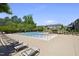 Community pool with lounge chairs and tables for outdoor relaxation at 322 Brier Crossings Loop, Durham, NC 27703