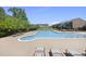 Community pool with ample seating for residents at 322 Brier Crossings Loop, Durham, NC 27703