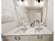 Bright bathroom with double sink vanity, modern fixtures, and neutral paint at 332 Cottage Hl, Knightdale, NC 27604