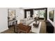 Stylish living room with comfortable seating, modern decor, and plenty of natural light at 332 Cottage Hl, Knightdale, NC 27604