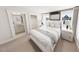 Cozy main bedroom with neutral tones, natural light, and a serene atmosphere at 332 Cottage Hl, Knightdale, NC 27604
