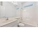 Bright bathroom with a shower-tub combo and a large mirror above the sink at 3404 Apple Meadow Dr, Fuquay Varina, NC 27526