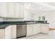 View of the kitchen featuring white cabinetry and stainless steel appliances at 3404 Apple Meadow Dr, Fuquay Varina, NC 27526
