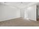 Large bedroom featuring a ceiling fan and neutral carpet at 3404 Apple Meadow Dr, Fuquay Varina, NC 27526