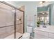Bathroom featuring a glass enclosed shower, granite countertops, and tiled walls at 3609 Jordan Shires Dr, New Hill, NC 27562