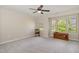 Bright bedroom with neutral walls, carpeted floor, and ceiling fan at 3609 Jordan Shires Dr, New Hill, NC 27562