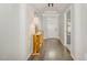 Bright foyer with hardwood floors, decorative lighting, and stylish console table at 3609 Jordan Shires Dr, New Hill, NC 27562