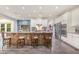 Large kitchen featuring a center island with bar stool seating and modern appliances at 3609 Jordan Shires Dr, New Hill, NC 27562