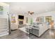 Comfortable living room featuring a fireplace with stone accents and a flat screen television at 3609 Jordan Shires Dr, New Hill, NC 27562