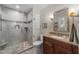 Updated bathroom features tiled walk-in shower and granite vanity at 404 Emerywood Dr, Raleigh, NC 27615
