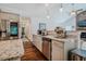 Stylish kitchen featuring stainless steel appliances and a view into the living room at 4072 Mackenzie Dr, Haw River, NC 27258