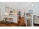 Modern kitchen with stainless steel appliances, granite countertops and barstool seating at 4072 Mackenzie Dr, Haw River, NC 27258
