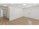 The bedroom has updated laminate flooring with a closet and a window at 410 Caswell St, Burlington, NC 27217