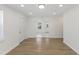 Bright, open space with new flooring, neutral walls, and lots of natural light, creating a welcoming and airy feel at 410 Caswell St, Burlington, NC 27217