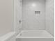 Shower and tub with a sleek, clean, and modern look at 410 Caswell St, Burlington, NC 27217