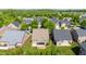 Beautiful aerial view of this home's backyard with a covered patio at 4116 Argyle Trl, Burlington, NC 27215