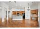 Open concept kitchen with ample storage, stainless appliances, and eat-in island at 4116 Argyle Trl, Burlington, NC 27215
