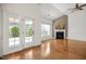 Living area boasts hardwood floors, modern paint scheme, and tons of natural light at 4116 Argyle Trl, Burlington, NC 27215