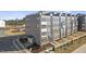 A high angle view of new townhome construction with sidewalks and professional landscaping at 412 Gaston Park Ln # 200, Wake Forest, NC 27587