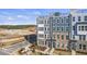 Stunning exterior elevation of newly constructed townhomes with modern design elements at 414 Gaston Park Ln # 200, Wake Forest, NC 27587