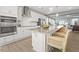 Bright kitchen featuring a large island with bar seating and stainless steel appliances at 414 Gaston Park Ln # 200, Wake Forest, NC 27587