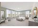Bright main bedroom featuring large windows, neutral tones, and contemporary furniture at 414 Gaston Park Ln # 200, Wake Forest, NC 27587