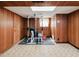 Basement featuring a workout area with weightlifting equipment and rubber floor mats at 4205 Woodlawn Dr, Raleigh, NC 27616
