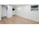 Basement featuring a window for natural light and an open closet at 4205 Woodlawn Dr, Raleigh, NC 27616
