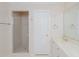 Bathroom with a walk in glass shower and white tiled floor at 4205 Woodlawn Dr, Raleigh, NC 27616