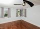 Bedroom boasting hardwood floors, neutral paint, and plenty of natural light at 4205 Woodlawn Dr, Raleigh, NC 27616