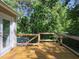 Deck overlooking the pool, providing a great space for outdoor entertaining at 4205 Woodlawn Dr, Raleigh, NC 27616