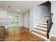 Spacious eat-in kitchen with granite countertops, stainless steel appliances, and hardwood floors at 4205 Woodlawn Dr, Raleigh, NC 27616