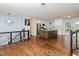 Spacious eat-in kitchen with granite countertops, stainless steel appliances, and hardwood floors at 4205 Woodlawn Dr, Raleigh, NC 27616