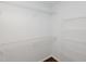 A walk-in closet featuring wire shelving for ample storage space at 4205 Woodlawn Dr, Raleigh, NC 27616