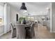 Dining room with a chandelier that opens up to the living room and kitchen at 429 Providence Springs Ln, Fuquay Varina, NC 27526