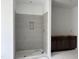 Modern bathroom featuring a tiled shower with a built-in niche and vanity at 4317 Emeline Way # 12, Fuquay Varina, NC 27526