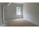 Bedroom with a bright window, offering a clear view of the outdoors at 4317 Emeline Way # 12, Fuquay Varina, NC 27526