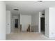 Unfinished living room featuring a staircase with wood and metal banisters at 4317 Emeline Way # 12, Fuquay Varina, NC 27526