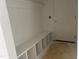 Bright mudroom featuring a custom storage bench with cubbies and coat hooks at 4317 Emeline Way # 12, Fuquay Varina, NC 27526