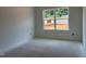 Unfinished room features a large window allowing natural light at 4317 Emeline Way # 12, Fuquay Varina, NC 27526