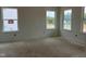 Unfinished room with multiple windows providing ample natural light and views at 4317 Emeline Way # 12, Fuquay Varina, NC 27526