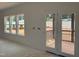 Unfinished area showcases a glass door with adjacent windows providing views of the outdoors at 4317 Emeline Way # 12, Fuquay Varina, NC 27526