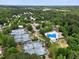 Overhead view showcasing the community pool, tennis courts, lush landscaping, and neighborhood homes at 4902 Cedar Glen Dr, Durham, NC 27713