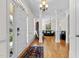 Bright foyer with arched entryway, pillars, and a view into the spacious living area at 5619 Bennettwood Ct, Raleigh, NC 27612