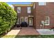 Brick patio area with outdoor grill, ideal for entertainment at 5619 Bennettwood Ct, Raleigh, NC 27612