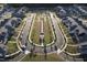 Aerial view of new construction neighborhood and green spaces at 636 Ginger Mint Cir, Knightdale, NC 27545